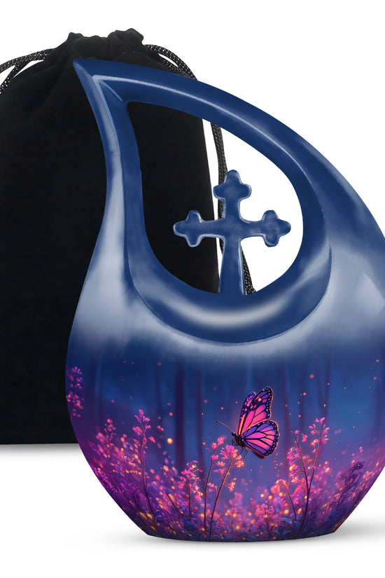 Powder Blue Butterfly Cremation Urn top-down view of secure threaded lid - sacred cross merged with butterfly motif on metal - full-size 10 inch 200 cubic inch adult cremation urn