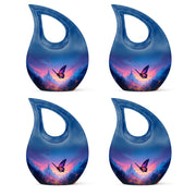 Indigo Butterfly Cremation Urn lifestyle display on memorial shelf - cross and butterfly combined in spiritual memorial design - 10 inch aluminum urn for cremated remains