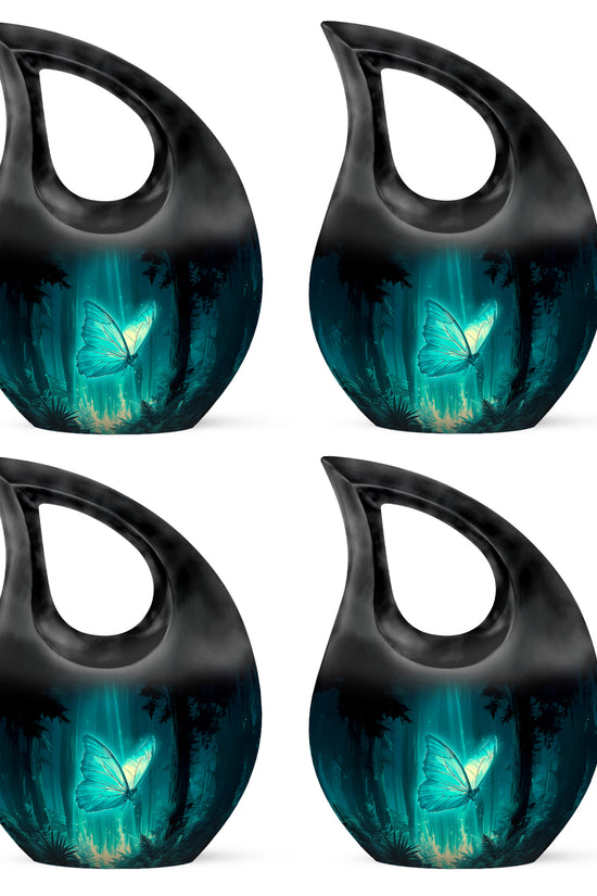Cool Teal Butterfly Cremation Urn lifestyle display on memorial shelf - sacred cross merged with butterfly motif on metal - 10 inch aluminum urn for cremated remains