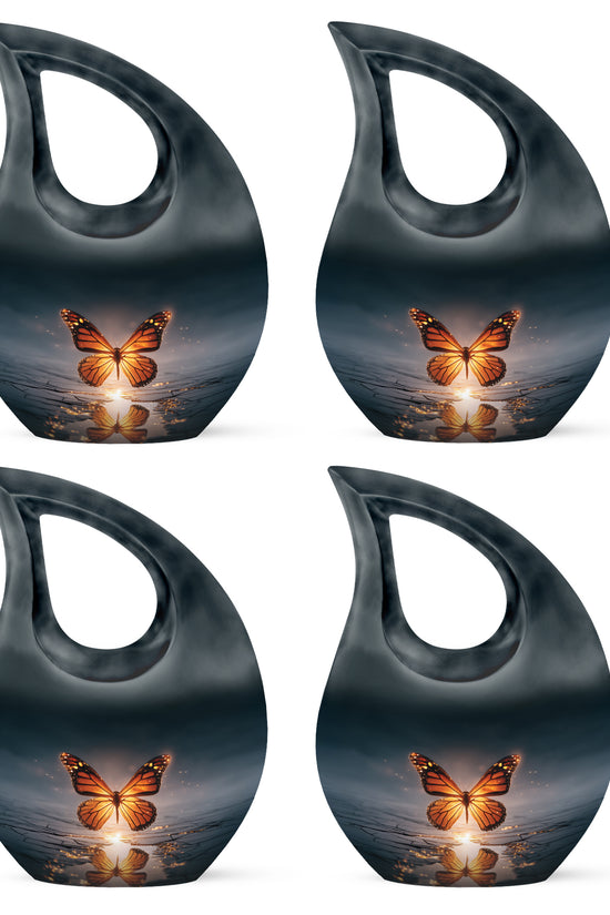 Navy Blue Butterfly Cremation Urn lifestyle display on memorial shelf - cross and butterfly combined in spiritual memorial design - 10 inch aluminum urn for cremated remains