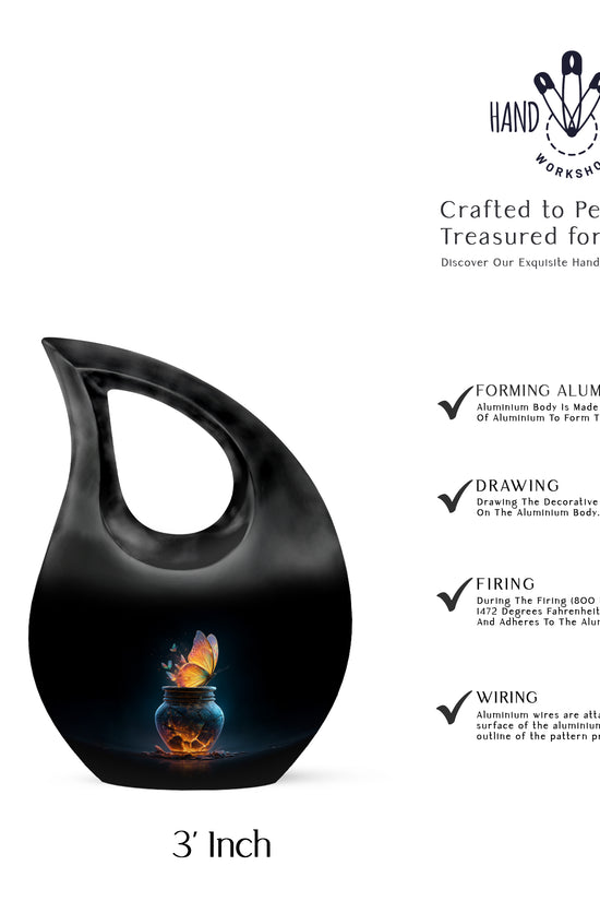 Rich Black Butterfly Cremation Urn back view with polished surface - sacred cross merged with butterfly motif on metal - mini keepsake memorial for portion of cremation ashes