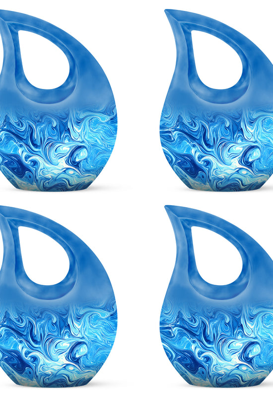 Sapphire Blue Blue Cremation Urn lifestyle display on memorial shelf - faith-inspired cross-drop urn with blue pattern - 10 inch aluminum urn for cremated remains