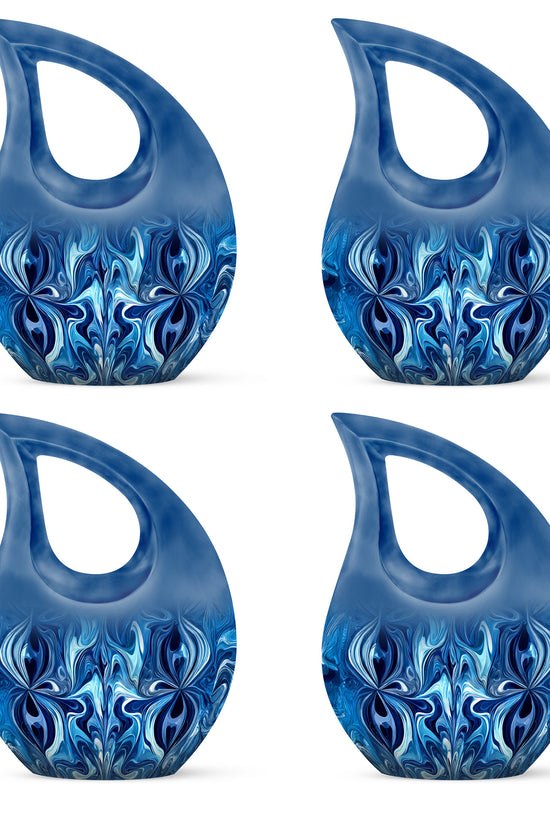 Icy Blue Blue Cremation Urn lifestyle display on memorial shelf - sacred cross merged with blue motif on metal - 10 inch aluminum urn for cremated remains