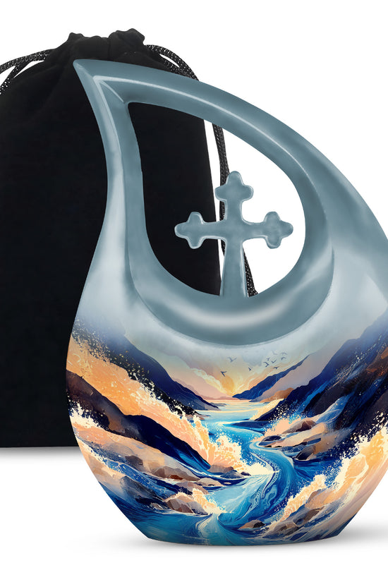 Pastel Blue Blue Cremation Urn top-down view of secure threaded lid - sacred cross merged with blue motif on metal - full-size 10 inch 200 cubic inch adult cremation urn