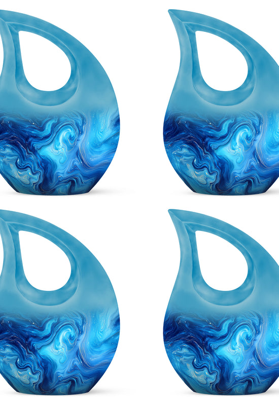 Deep Teal Blue Cremation Urn lifestyle display on memorial shelf - devotional cross-drop blue engraving - 10 inch aluminum urn for cremated remains