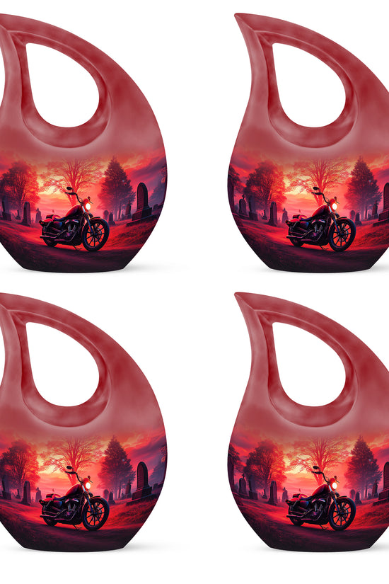 Scarlet Red Bike Cremation Urn lifestyle display on memorial shelf - devotional cross-drop bike engraving - 10 inch aluminum urn for cremated remains