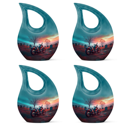 Ocean Teal Bike Cremation Urn lifestyle display on memorial shelf - cross and bike combined in spiritual memorial design - 10 inch aluminum urn for cremated remains