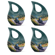 Pastel Blue Bike Cremation Urn lifestyle display on memorial shelf - cross and bike combined in spiritual memorial design - 10 inch aluminum urn for cremated remains