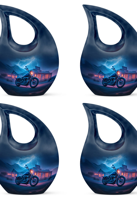Dusty Blue Bike Cremation Urn lifestyle display on memorial shelf - cross and bike combined in spiritual memorial design - 10 inch aluminum urn for cremated remains