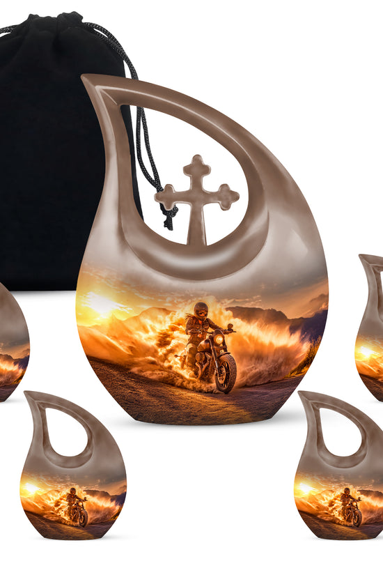 Sunrise Gold Bike Cremation Urn urn with complimentary velvet bag - cross and bike combined in spiritual memorial design - memorial set with one large and four small urns
