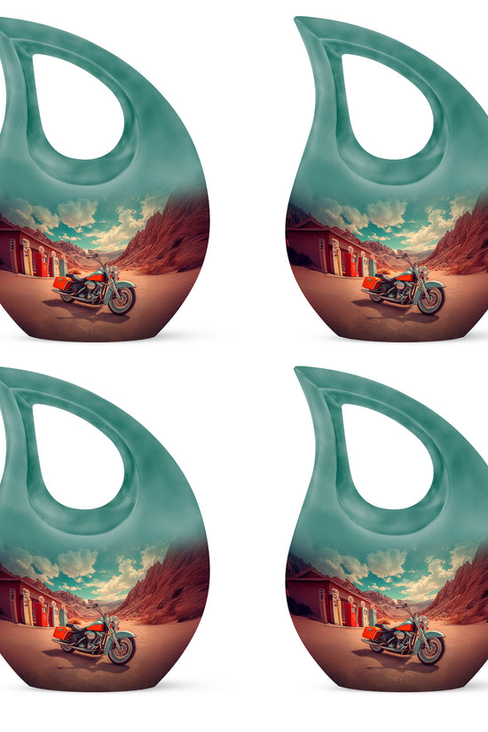 Jewel Teal Bike Cremation Urn lifestyle display on memorial shelf - cross and bike combined in spiritual memorial design - 10 inch aluminum urn for cremated remains