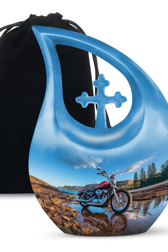 Soft Blue Bike Cremation Urn top-down view of secure threaded lid - devotional cross-drop bike engraving - full-size 10 inch 200 cubic inch adult cremation urn