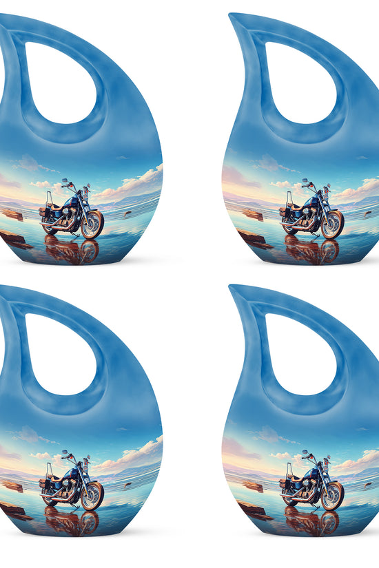 Steel Blue Bike Cremation Urn lifestyle display on memorial shelf - faith-inspired cross-drop urn with bike pattern - 10 inch aluminum urn for cremated remains