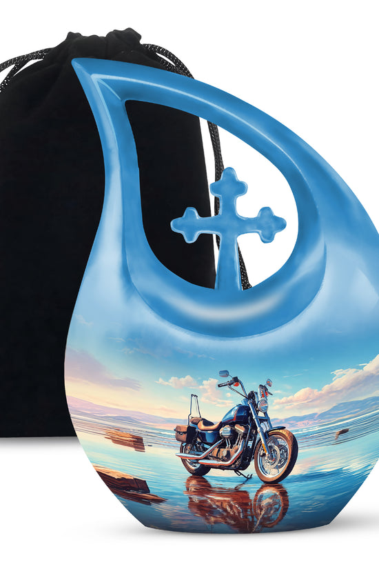 Slate Blue Bike Cremation Urn top-down view of secure threaded lid - sacred cross merged with bike motif on metal - full-size 10 inch 200 cubic inch adult cremation urn