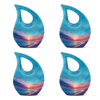 Mystic Teal Beach Cremation Urn lifestyle display on memorial shelf - devotional cross-drop beach engraving - 10 inch aluminum urn for cremated remains