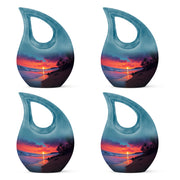 Azure Beach Cremation Urn lifestyle display on memorial shelf - sacred cross merged with beach motif on metal - 10 inch aluminum urn for cremated remains