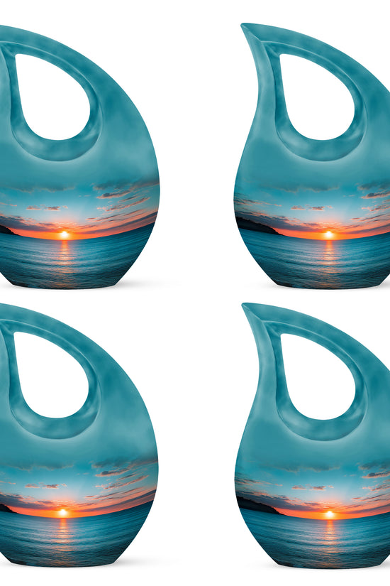 Cool Teal Beach Cremation Urn lifestyle display on memorial shelf - sacred cross merged with beach motif on metal - 10 inch aluminum urn for cremated remains