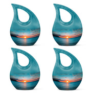 Cool Teal Beach Cremation Urn lifestyle display on memorial shelf - sacred cross merged with beach motif on metal - 10 inch aluminum urn for cremated remains