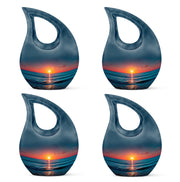 Pastel Blue Beach Cremation Urn lifestyle display on memorial shelf - cross and beach combined in spiritual memorial design - 10 inch aluminum urn for cremated remains