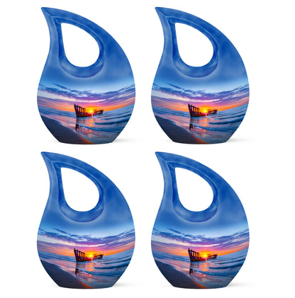 Soft Blue Beach Cremation Urn lifestyle display on memorial shelf - faith-inspired cross-drop urn with beach pattern - 10 inch aluminum urn for cremated remains
