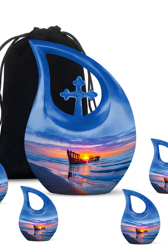 Pastel Blue Beach Cremation Urn urn with complimentary velvet bag - sacred cross merged with beach motif on metal - memorial set with one large and four small urns