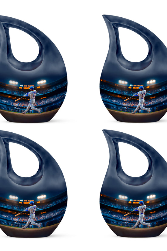 Navy Blue Baseball Cremation Urn lifestyle display on memorial shelf - cross and baseball combined in spiritual memorial design - 10 inch aluminum urn for cremated remains