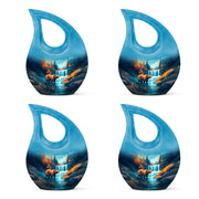 Deep Teal Bear Cremation Urn lifestyle display on memorial shelf - faith-inspired cross-drop urn with bear pattern - 10 inch aluminum urn for cremated remains