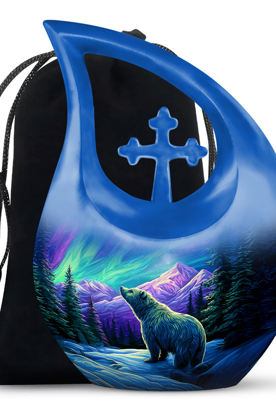 Pastel Blue Bear Cremation Urn top-down view of secure threaded lid - sacred cross merged with bear motif on metal - full-size 10 inch 200 cubic inch adult cremation urn