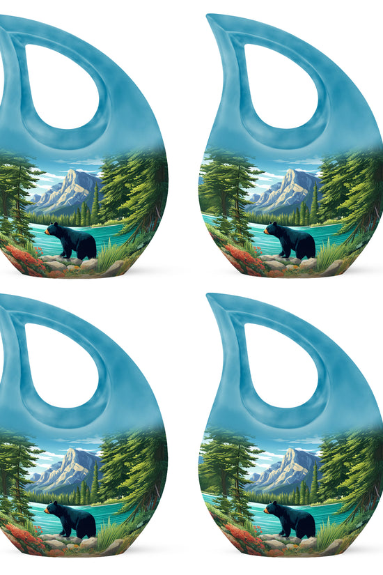 Slate Blue Bear Cremation Urn lifestyle display on memorial shelf - cross and bear combined in spiritual memorial design - 10 inch aluminum urn for cremated remains