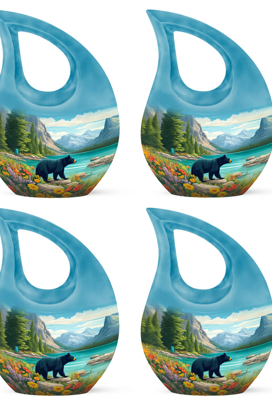 Sea Green Teal Bear Cremation Urn lifestyle display on memorial shelf - cross and bear combined in spiritual memorial design - 10 inch aluminum urn for cremated remains