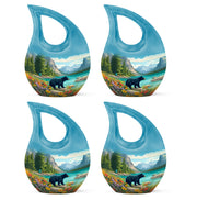 Sea Green Teal Bear Cremation Urn lifestyle display on memorial shelf - cross and bear combined in spiritual memorial design - 10 inch aluminum urn for cremated remains