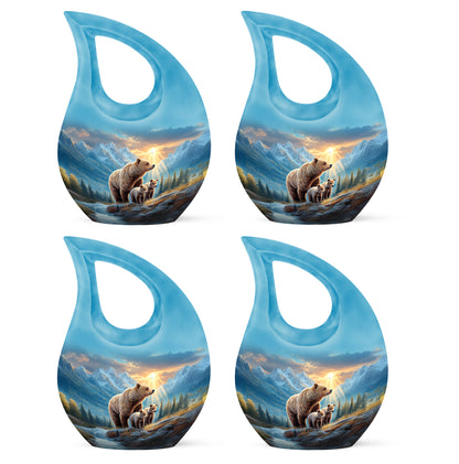 Azure Bear Cremation Urn lifestyle display on memorial shelf - cross and bear combined in spiritual memorial design - 10 inch aluminum urn for cremated remains