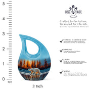 Dusty Blue Bear Cremation Urn back view with polished surface - sacred cross merged with bear motif on metal - mini keepsake memorial for portion of cremation ashes
