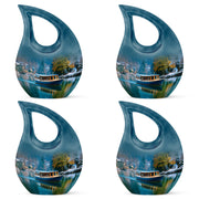 Powder Blue Boat Cremation Urn lifestyle display on memorial shelf - sacred cross merged with boat motif on metal - 10 inch aluminum urn for cremated remains