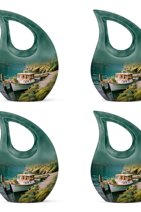 Sea Green Teal Boat Cremation Urn lifestyle display on memorial shelf - cross and boat combined in spiritual memorial design - 10 inch aluminum urn for cremated remains