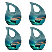 Mystic Teal Boat Cremation Urn lifestyle display on memorial shelf - devotional cross-drop boat engraving - 10 inch aluminum urn for cremated remains
