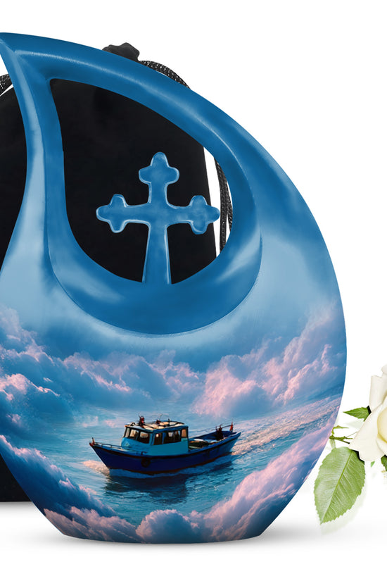 Indigo Boat Cremation Urn top-down view of secure threaded lid - sacred cross merged with boat motif on metal - full-size 10 inch 200 cubic inch adult cremation urn
