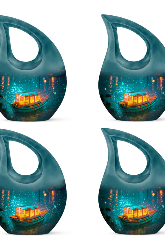 Tropical Teal Boat Cremation Urn lifestyle display on memorial shelf - devotional cross-drop boat engraving - 10 inch aluminum urn for cremated remains