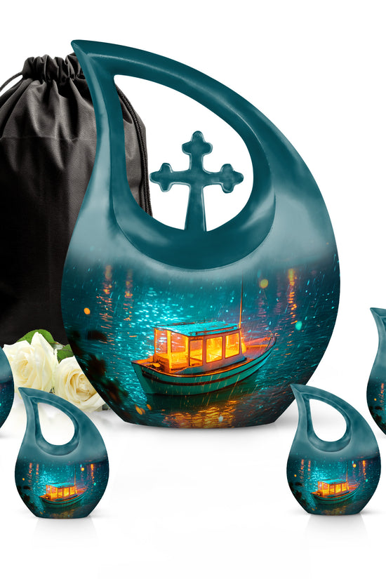 Ocean Teal Boat Cremation Urn urn with complimentary velvet bag - sacred cross merged with boat motif on metal - memorial set with one large and four small urns