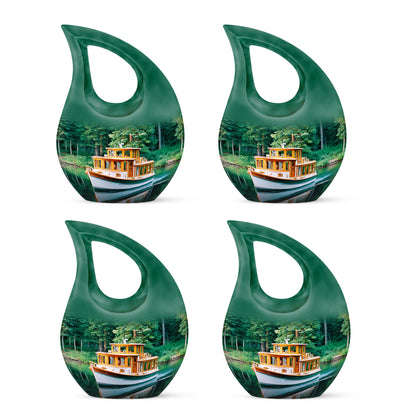 Soft Teal Boat Cremation Urn lifestyle display on memorial shelf - cross and boat combined in spiritual memorial design - 10 inch aluminum urn for cremated remains