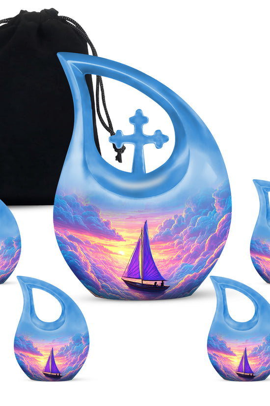 Navy Blue Boat Cremation Urn urn with complimentary velvet bag - sacred cross merged with boat motif on metal - memorial set with one large and four small urns