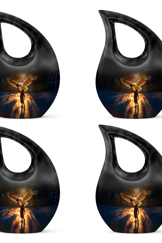 Rich Black Basketball Cremation Urn lifestyle display on memorial shelf - sacred cross merged with basketball motif on metal - 10 inch aluminum urn for cremated remains