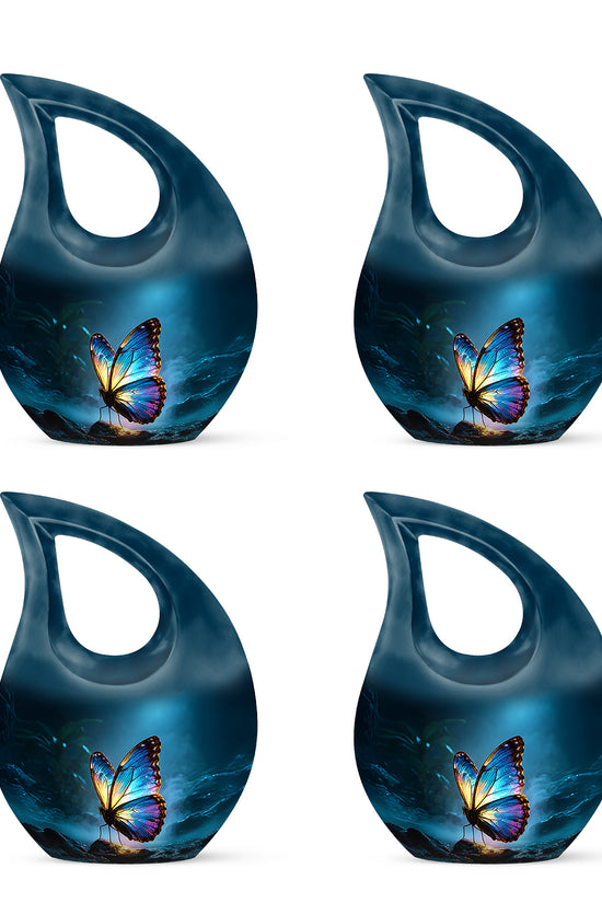 Royal Blue Butterfly Cremation Urn lifestyle display on memorial shelf - devotional cross-drop butterfly engraving - 10 inch aluminum urn for cremated remains