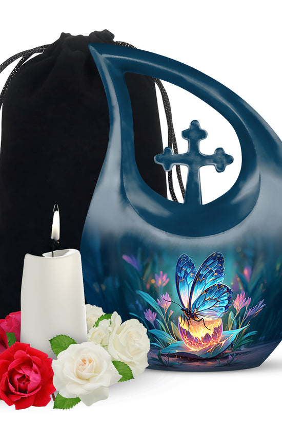 Indigo Butterfly Cremation Urn top-down view of secure threaded lid - sacred cross merged with butterfly motif on metal - full-size 10 inch 200 cubic inch adult cremation urn