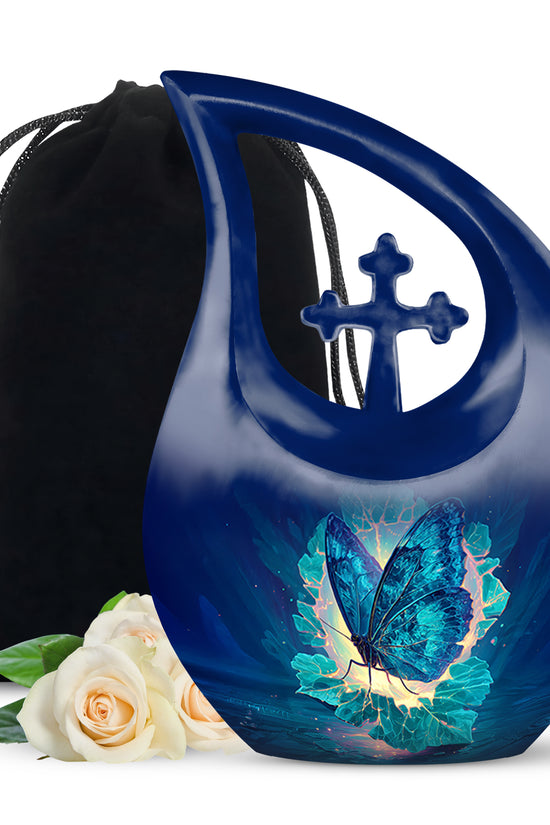 Navy Blue Butterfly Cremation Urn top-down view of secure threaded lid - sacred cross merged with butterfly motif on metal - full-size 10 inch 200 cubic inch adult cremation urn