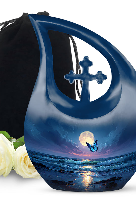 Indigo Butterfly Cremation Urn top-down view of secure threaded lid - sacred cross merged with butterfly motif on metal - full-size 10 inch 200 cubic inch adult cremation urn