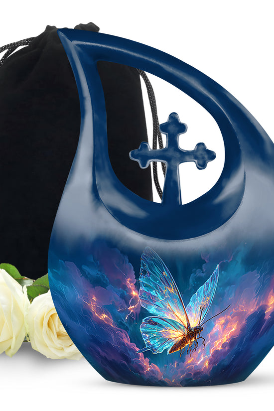 Misty Blue Butterfly Cremation Urn top-down view of secure threaded lid - sacred cross merged with butterfly motif on metal - full-size 10 inch 200 cubic inch adult cremation urn