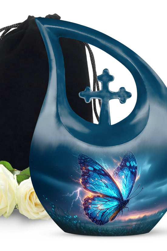 Icy Blue Butterfly Cremation Urn top-down view of secure threaded lid - sacred cross merged with butterfly motif on metal - full-size 10 inch 200 cubic inch adult cremation urn