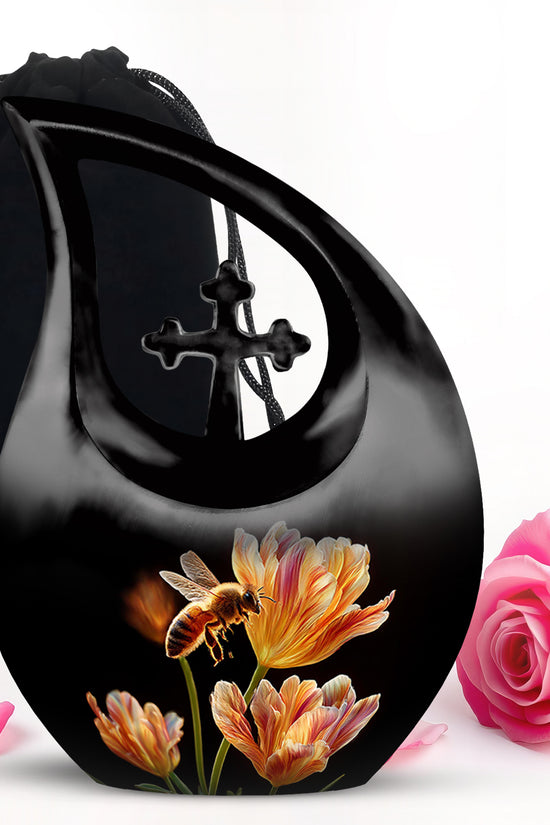 Deep Black Bee Cremation Urn top-down view of secure threaded lid - sacred cross merged with bee motif on metal - full-size 10 inch 200 cubic inch adult cremation urn
