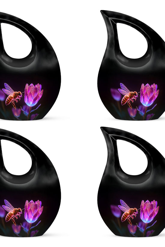 Glossy Black Bee Cremation Urn lifestyle display on memorial shelf - cross and bee combined in spiritual memorial design - 10 inch aluminum urn for cremated remains